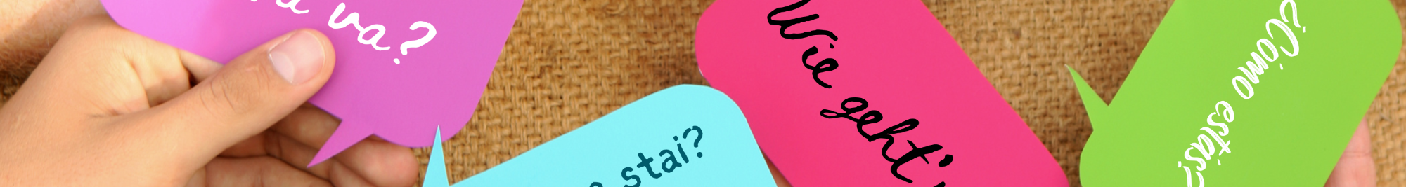 Image of modern foreign language phrases in speech bubbles