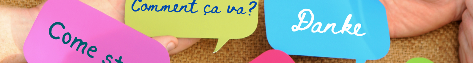 Image of modern foreign language phrases in speech bubbles